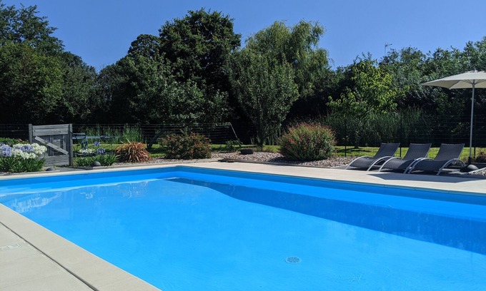 Vesly Cottage | Bright open plan barn conversion sleeps 8 - shared pool & tennis, dogs welcome
