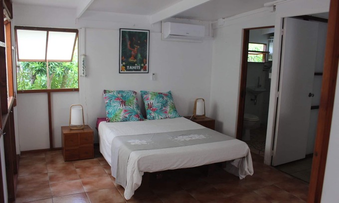 Temae House | Bungalow in shared garden with house, seafront and private beach.