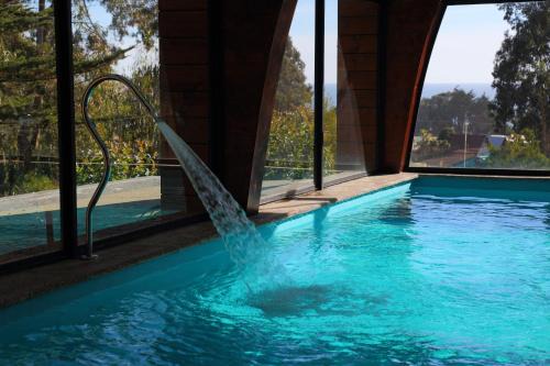 Pichilemu Apartment | Cabañas y Spa Costa Patagonia - Piscina Climatizada
