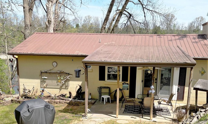 Lancaster Cabin | Cabin located on lakeside with accessible boat dock.