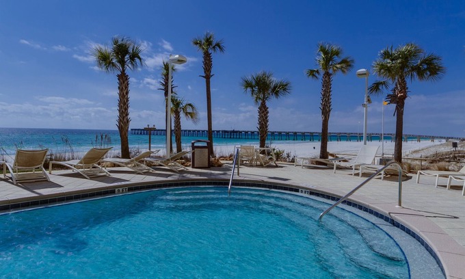 Panama City Beach Condo | Calypso 402 East - Beach Chairs, 2 King Suites, Free Activities Daily!