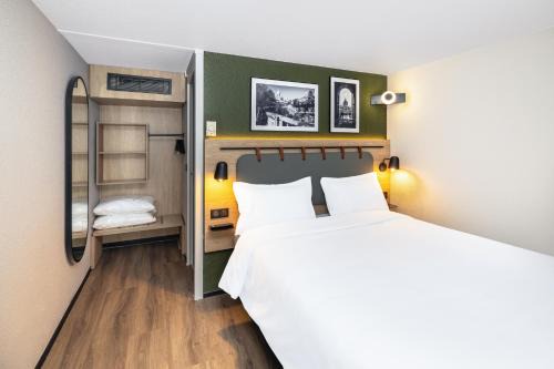 Saint-Francois d'Assise Hotel | Campanile NATURE - Besançon Ouest Chateaufarine