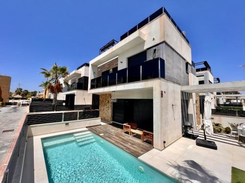 Orihuela Costa Ski Chalet | Cape villa in Cabo de Roig by Perfectly Rentals