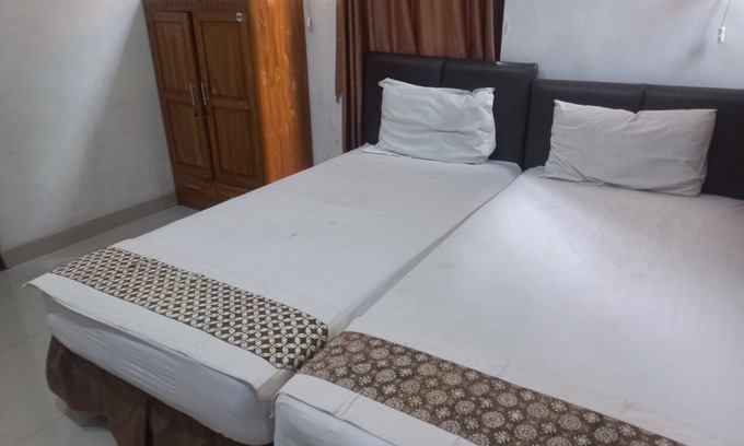 Purwokerto Hotel | Capital O 93872 Natura Guest House Syariah Near alun alun kota purwokerto