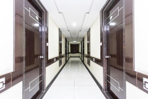 Rau Hotel | Capital O Swan Paradise
