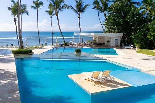Juan Dolio - El Pueblo Apartment | Caribbean Life Paradise,1BDRM & BBQ Beachfront Apt