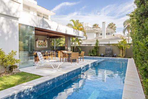 Jurere House | Casa 4 Suítes Jurerê Internacional - Faxineira e Cozinheira incluídos todos os dias