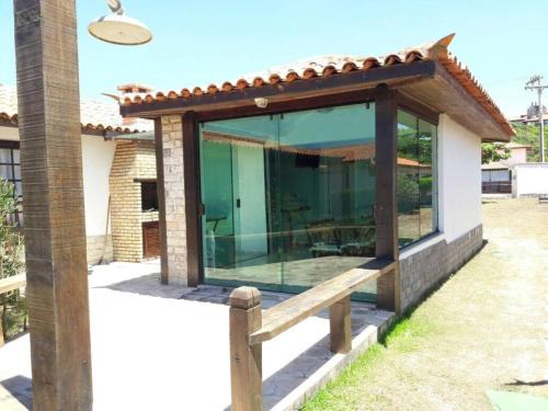 Praia Rasa House | Casa a 20 metros da praia, Wi-Fi em condomínio privado!