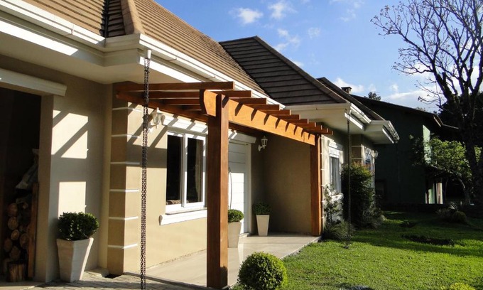 Tres Pinheiros House | Casa Ari Candiago Gramado