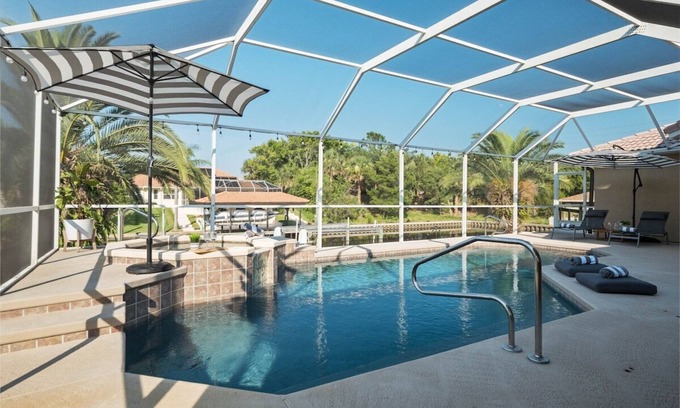 Palm Harbor House | Casa Canal: Waterfront Pool & Spa Retreat