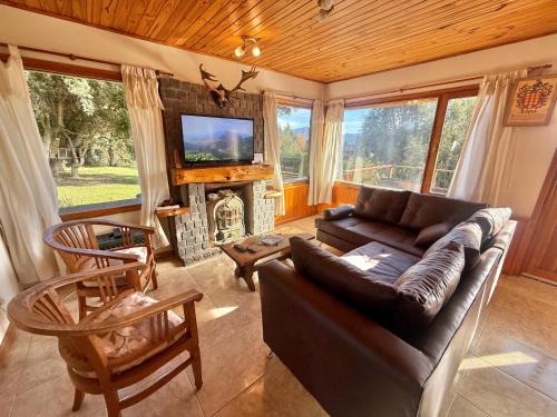 Angostura Ski Chalet | Casa de montaña By Los Amancays