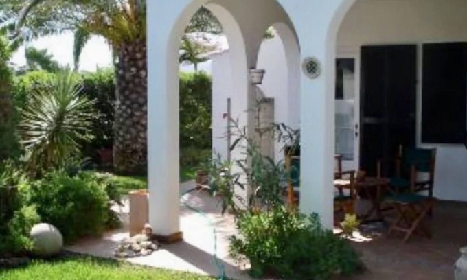 Cap d'Artrutx House | Casa Il Sole. Unifamiliar adosada casa con jardín. Cap D'Artrutx, Menorca.