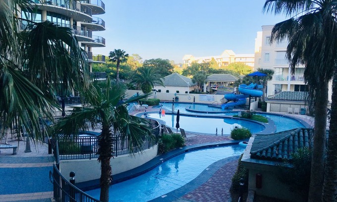 Orange Beach Apartment | Casa on the Cove~Water Slide & Lazy River~ Pet Friendly~Overlooking Marina