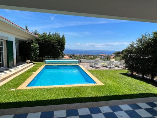 Sao Martinho Villa | Casa Roc Madeira - 5 Bedrooms - Ocean and City Views - Private Heated Pool