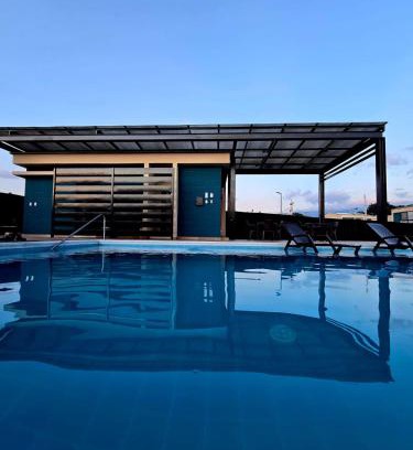 La Tebaida House | Casa Vacacional Piscina, Jacuzzy, Sauna a 2m del Aeropuerto el Eden AXM, 20m Parque del cafe y 15m de Armenia by Molca Xperiences