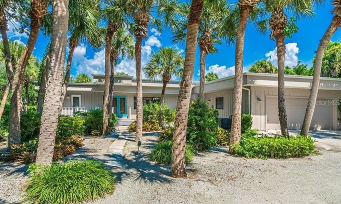 Nokomis House | Casey Key Oasis 3BR home on .75 acre w heated pool, boat dock, beach access