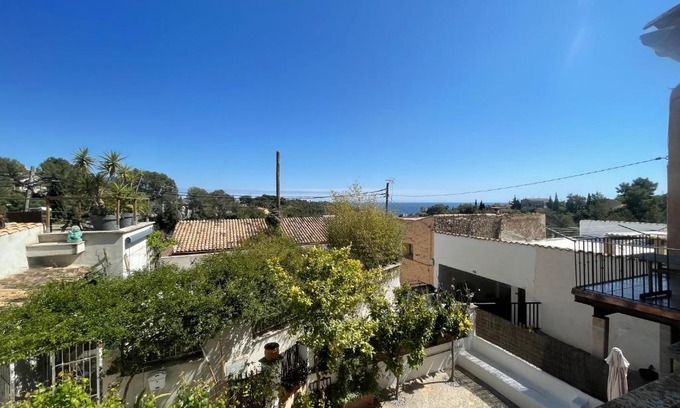 Genova House | Casita rosa