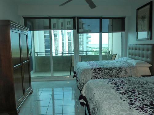 Mid Beach House | Castle PH12 Spacious Bay View Penthouse, Pool, Tennis, Free Parking