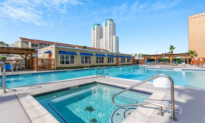 South Padre Island Condo | Casual condo close to beach w/pool & grills!