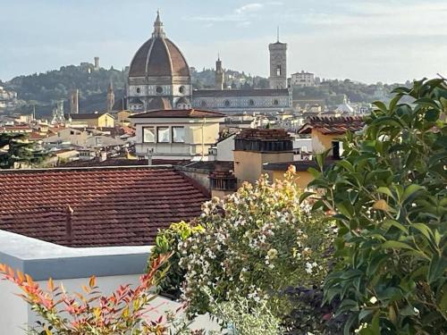 San Lorenzo Apartment | Caterina de' Medici luxury attic with terrace and parking