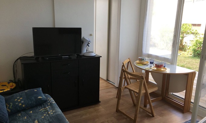 Merville-Franceville-Plage Apartment | Central Apartment with Terrace, Close to Beach, Pets Allowed