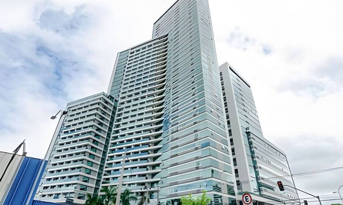 Reboucas Apartment | Central Studio in the 7Th Avenue Building, with air and parking space