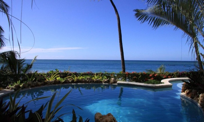 Black Rock Apartment | Chaconia Suite, a stunning luxurious beach front self catering apartment