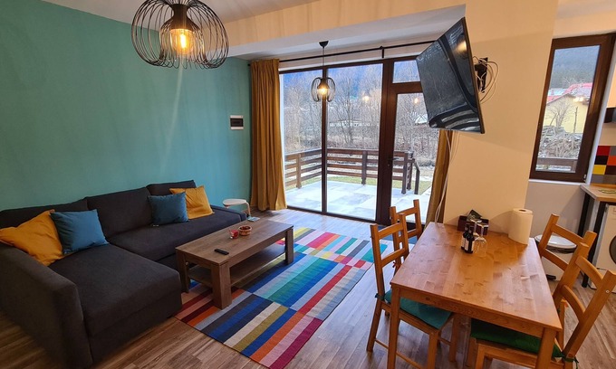 Busteni House | Chalet Cati Riverfront and Mountain View | Baby Crib