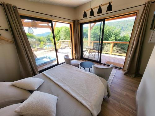 Saint-Affrique Ski Chalet | Chalet, hot tub and pool, quiet and with a view Sawadee lodge spa