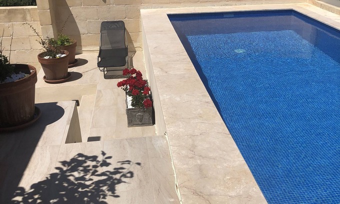 Xaghra House | Character farmhouse in Gozo with pool on roof terrace and fountain courtyard