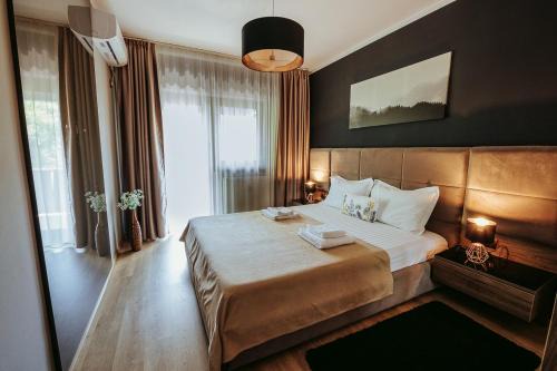 Oradea Apartment | Charlotte Apartment - 2Bedrooms w Parking near Nymphaea