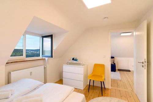 Buckenberg Apartment | Charmante Dachgeschosswohnung