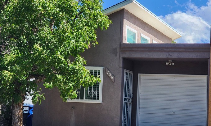 Northeast Heights House | Charming 2-bedroom house with refrigerated air, fridge in guest room, and WiFi