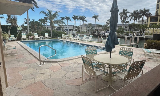 Marco Island Condo | Charming 2-bedroom condo in delightful Marco Island with AC, pool and dock.