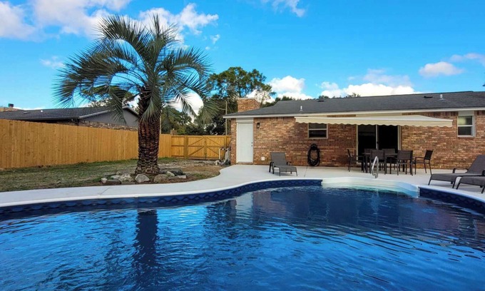 Northwest Pensacola House | Charming 3-bedroom house with Pool, Arcade in serene Pensacola