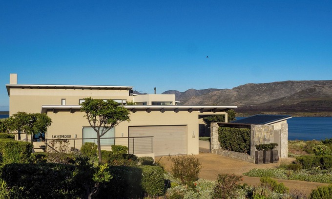 Fisherhaven Villa | Charming 4-bedroom villa with WiFi, AC in serene Hermanus