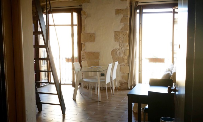 Cagliari Apartment | Charming and bright apartment in a 1900 building (wooden roof and stone walls)