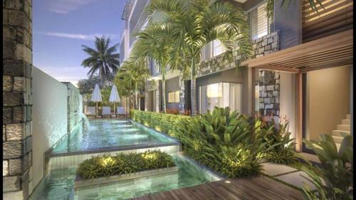 Flic-en-Flac Apartment | Charming apartment in Flic en Flac with shared pool