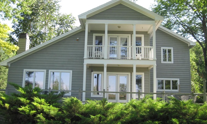 Beulah House | Charming Beachfront Vacation Home On Crystal Lake: September ‘25 available!