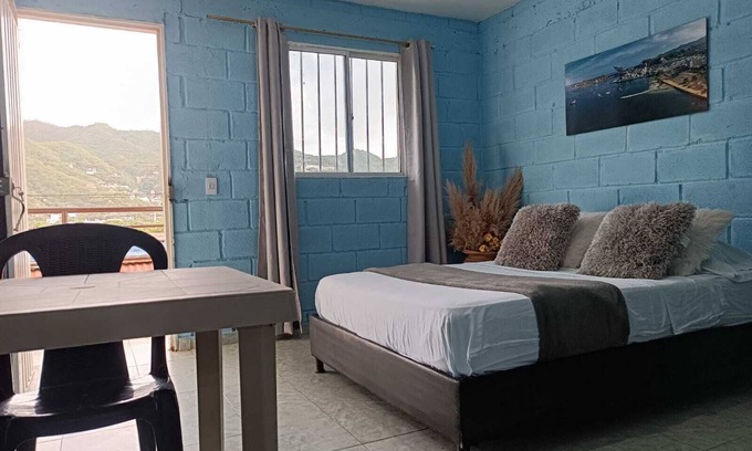Taganga Bed & Breakfast | Charming bed & breakfast with 6 bedrooms and WiFi, AC in brilliant Taganga