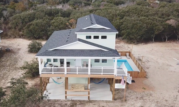 Carova Beach House | Charming Carova Cottage on 4x4 beach, Heated Pool, Hot Tub, Close Beach Access.