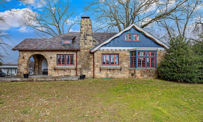 Eastwood Cottage | Charming cottage with pool, patio, central AC & fitness area