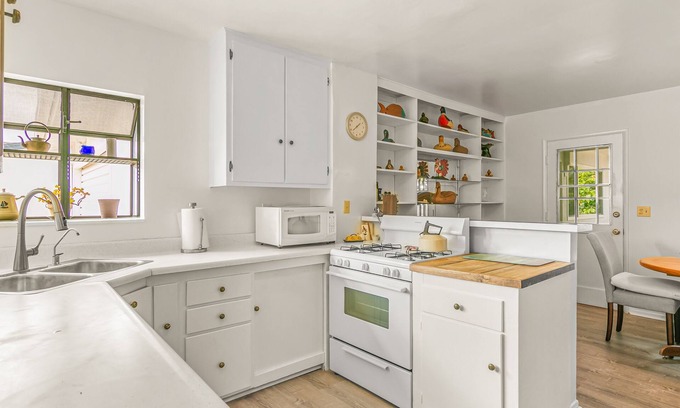 West Mesa House | Charming duplex with firepit, patio, & nature views - close to shores & trails