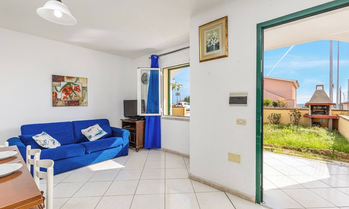 Tanaunella House | Charming Holiday Home Tanaunella appartamento 2 with Ventilators, Balcony, Terraces & Sea View; Parking Available, Pets Allowed