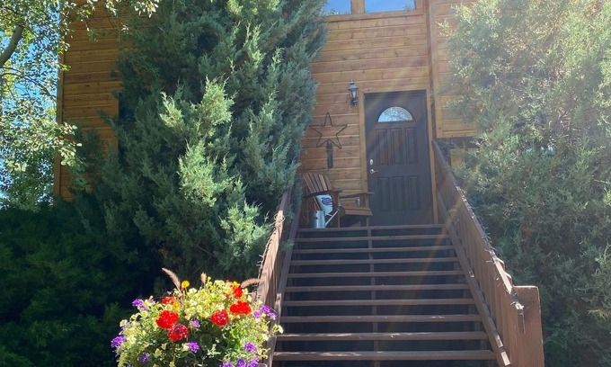 Driggs Cabin | Charming home on Ski Hill Road with lush landscaping and a new hot tub.