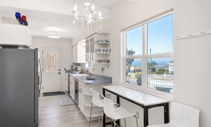 Park Hill House | Charming Home on the Hill with Ocean Views - two Queen beds and one full bed
