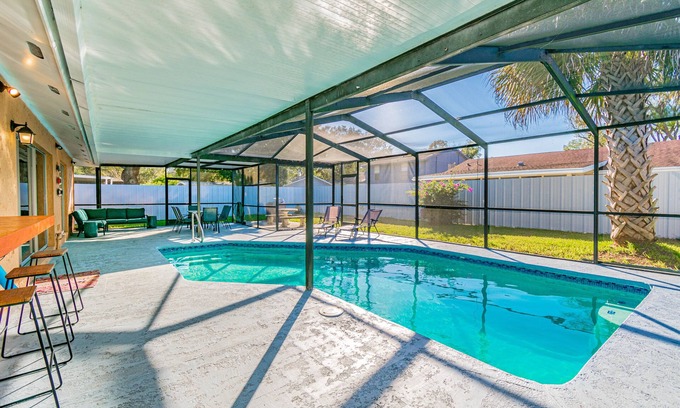 Tampa House | Charming home with amazing heated pool! Close to Airport, Beaches & Attractions.
