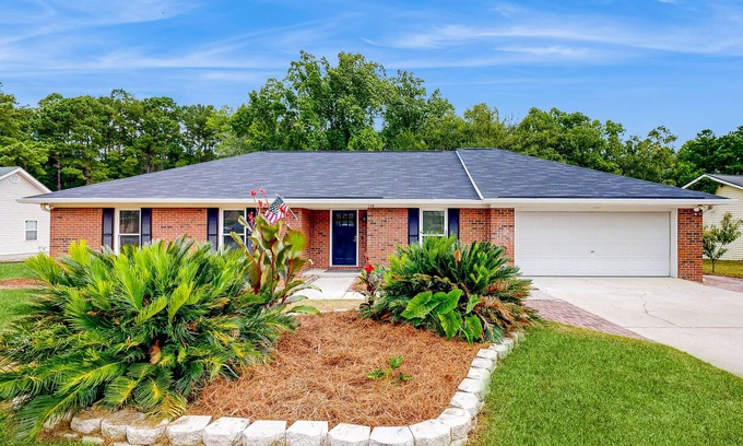 Rincon House | Charming home with large yard, fire pit, AC close to Outlet Mall and Airport