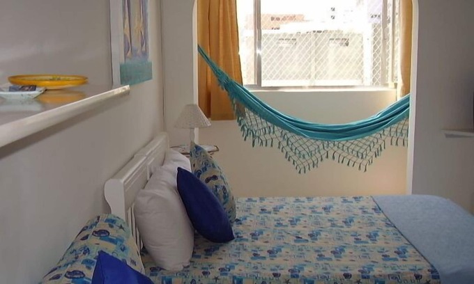 Pitangueiras Apartment | Charming kitnet ideal for couple 100 meters from the beach in Pitangueiras