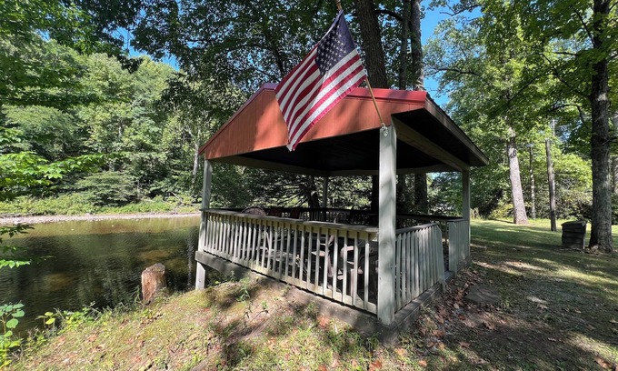 Elkins House | Charming riverfront home with beautiful views, hot tub and game room. Fishing!